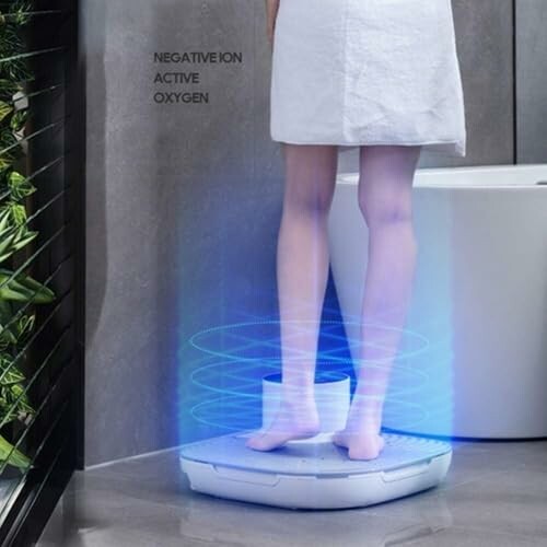 Woman standing on a platform emitting blue light with negative ion active oxygen text.